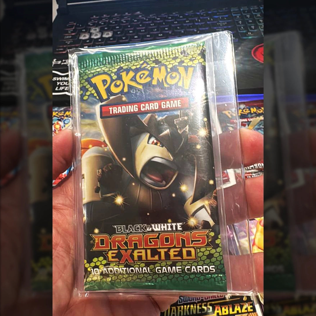 25X Pokmon Booster Packs and Golden Ticket MysteryPokeSlabs 25X Pokmon Booster Packs and Golden Ticket MysteryPokeSlabs